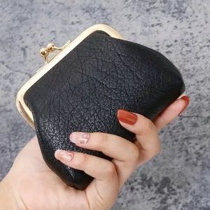Black vintage style coin purse with kiss lock closure